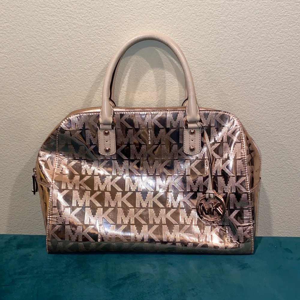 Michael Kors Rose Gold Purse. Like new gentle use as shown on handles in pic
